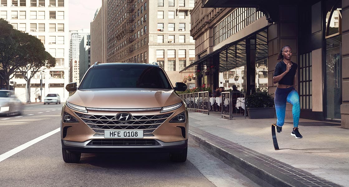 nexo 2019 front view with running woman